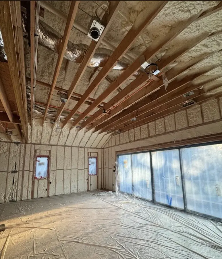 Interior walls and ceiling insulated with spray foam during new construction in Austin